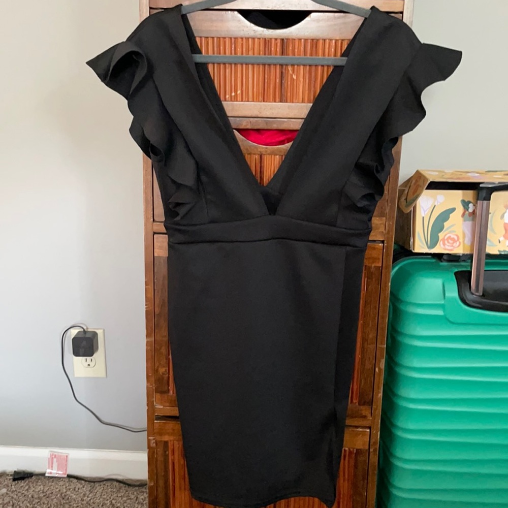 Deeeeep V black dress.